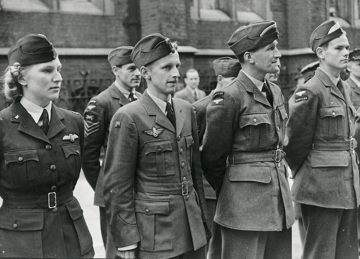 Strodl was part of the Danish community in London. Standing at the far left she is attending a parade in front of the Danish Council in Pont Street on King Christian X’s 73rd birthday on 26 September 1943 (Museum of Danish Resistance)