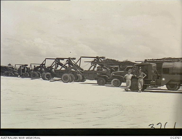 Earth moving equipment for 5 ACS lined up at Labuan, North Borneo, in February 1946 ready for shipping to Japan. Jensen joined the unit a few months after it had arrived in the country as part of the British Commonwealth Occupation Forces. (BCOF) (AWM OG3761)