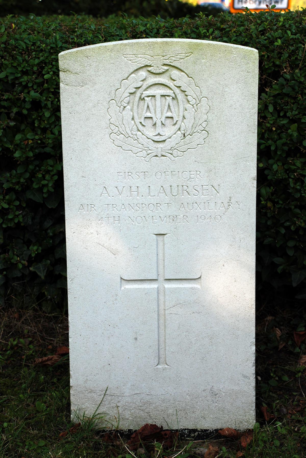 The headstone of Aage Valdemar Helstrup Laursen at Havarden (St. Deiniol) Churchyard.