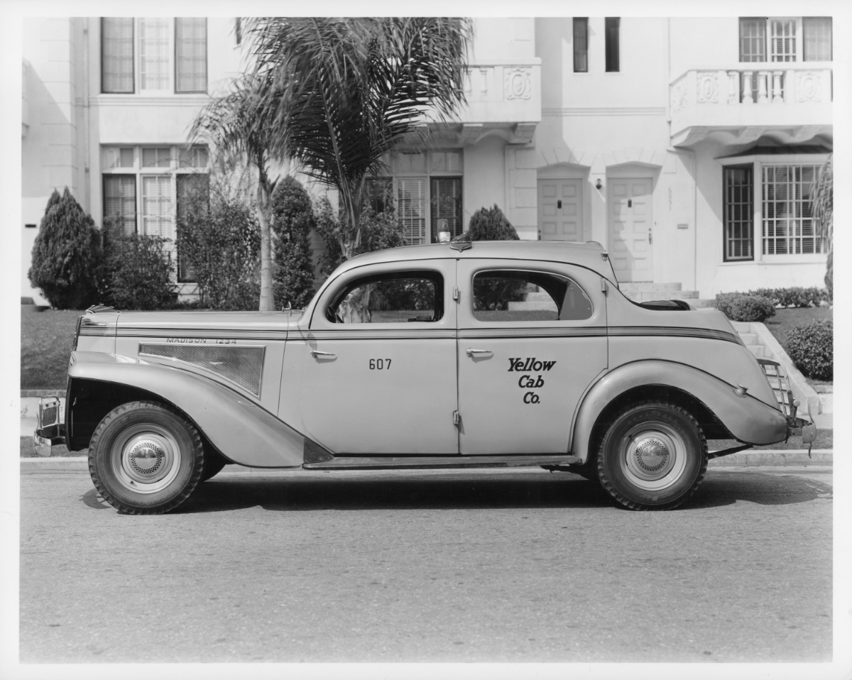 Photograph of a side view of a 1939 or 1940 Yellow Cab Company Packard taxi. This may be the kind of taxi O’Brien drove in her time as a Yellow Cab driver (Source: USC Libraries and California Historical Society)